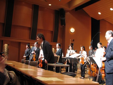 At the end of a performance with the NHK
		Friendship Orchestra